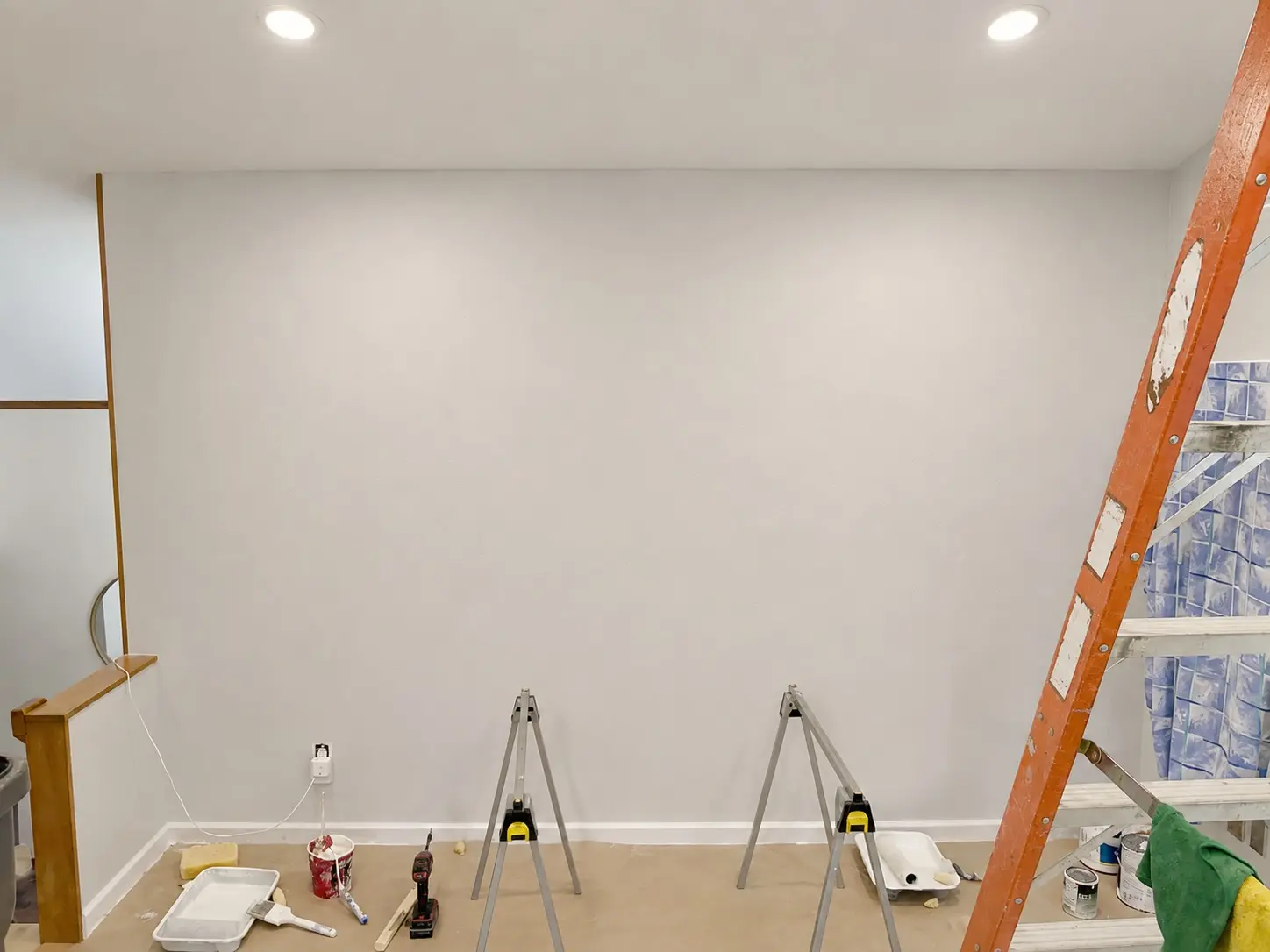 Drywall board and finished seams around a shower preparation area