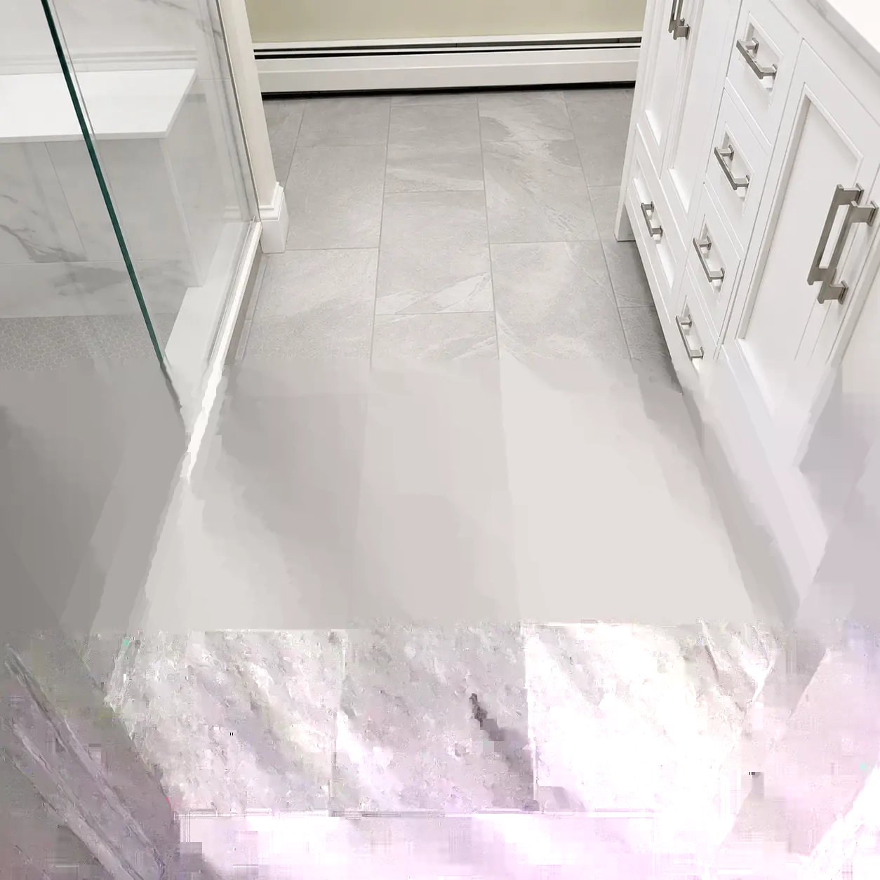 Restored shower tile and grout joints after repair work